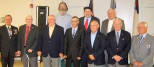 New Compatriots, row 1: Fort Henry Chapter president Jay Frey, Glen Baker, Jr., Ray Baker, Keith Baker, Bill Crowl, Bob Mead, WVSSAR president Bill Lester; row 2: Glen Baker, III, Michael Traubert, Bob McColloch